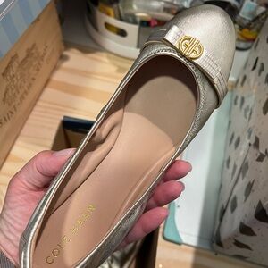 Brand new Gold Cole Haan flats